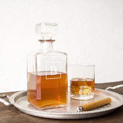 The engraved decanter will be a new focal point in your office or den