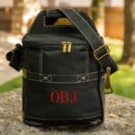 Sleek black 6-bottle cooler with personalized initials on the front