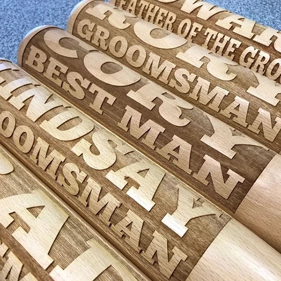 Full size baseball bats with engraved names