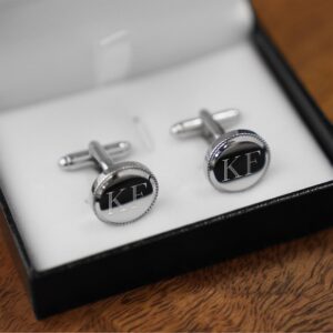 The beaded wedding cuff links arrive in a padded black gift box