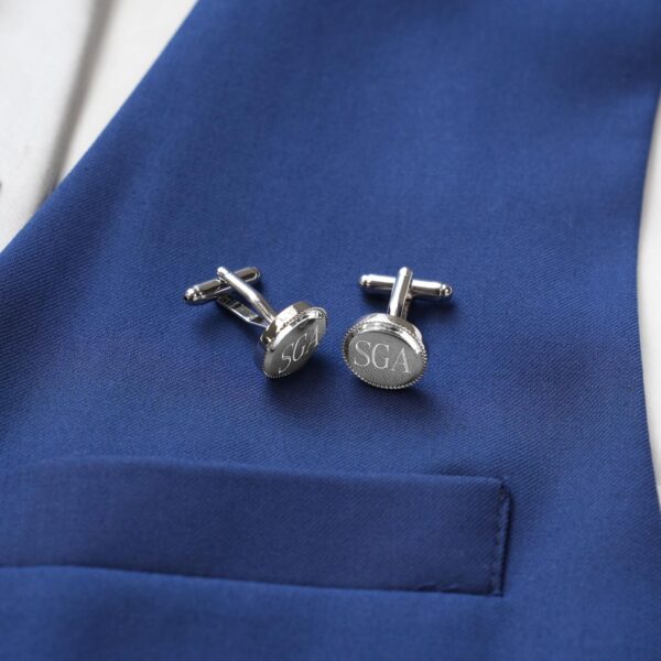 Beaded cuff links paired with a blue wedding suit