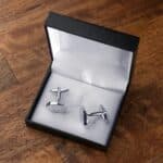 Silver oval cufflinks shown in included gift box
