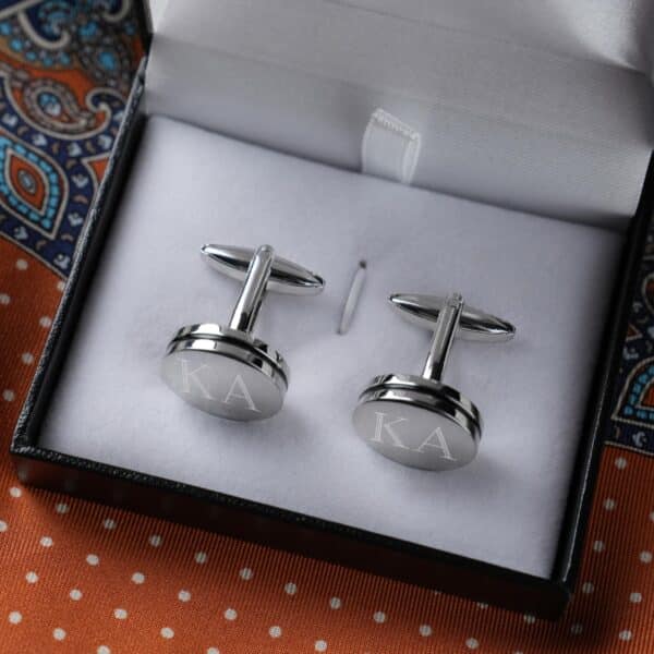 Free engraving is offered with each of the groomsman's initials