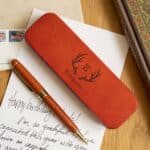 Rosewood pen set engraved with antler monogram design
