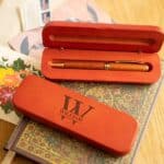 Rosewood pen set engraved with split monogram design