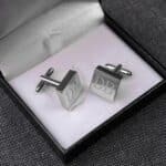 Each pair of silver square cuff links arrives in a black padded gift box