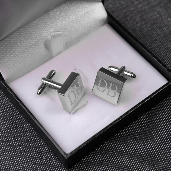 Each pair of silver square cuff links arrives in a black padded gift box