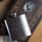 Steel groomsmen flask engraved with 2 lines of custom text
