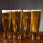 Groomsmen pilsner glass set engraved with traditional monogram