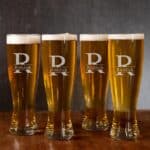 Groomsmen pilsner glass set engraved with split monogram design