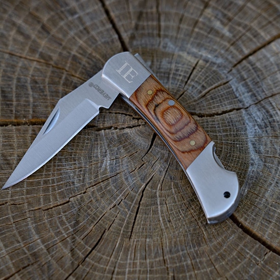 The Yukon Knife features a wood scaled handle with 4 inch blade.