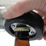 The bottom of the puck opens beer bottles with ease