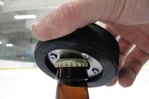 The bottom of the puck opens beer bottles with ease