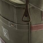 The should strap features a built-in bottle opener for cracking open cold ones with the groomsmen
