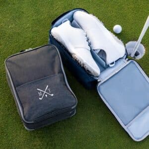 White golf shoes in a golf shoe bag