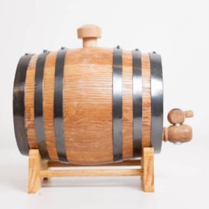Side view of mini bourbon barrel with stand, bung and spigot