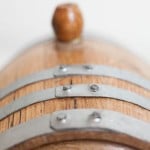 Top of mini bourbon barrel with silver hoops and bung