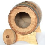 Trap door in back of card holder barrel for removing cards and envelopes