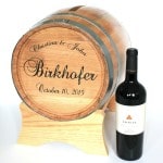 Card Holder Barrel with engraving example and next to Artesa bottle of wine