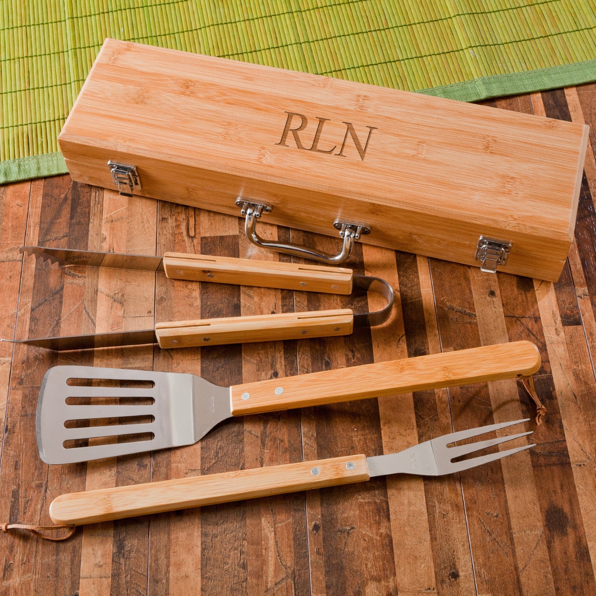 Perfect for backyard grill masters and tailgaters, this handy grill tool set is housed in a personalized case made from natural, high-quality bamboo.