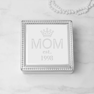 Engraved with the word MOM and the year of your choice