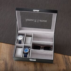 Interior of men's dresser box holds 4 watches and 3 pairs of sunglasses