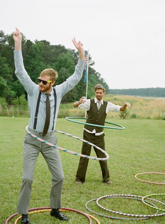 groomsmen hula hooping