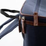 The faux leather accents are a nice touch to the backpack cooler.