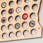 bottle caps easily slide into pre-cut holes in the map