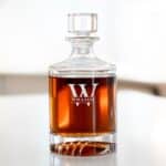 Circular decanter engraved with custom monograms