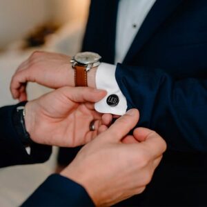 Groomsman wearing gunmetal black cufflinks