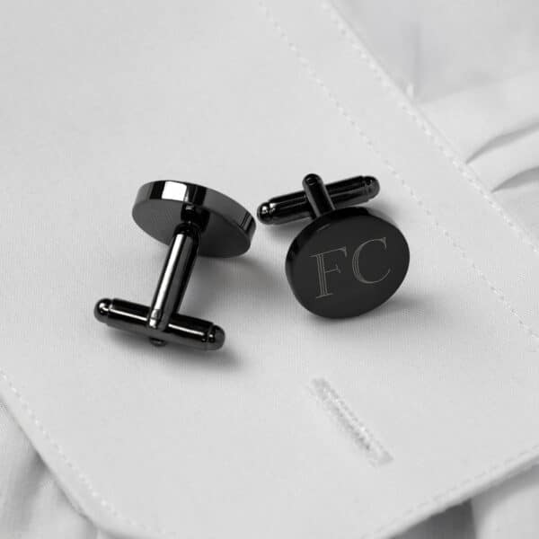 The matching black cufflinks are perfect for the wedding party.