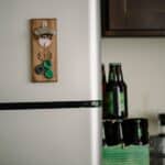 Wooden bottle opener that sticks to a refrigerator