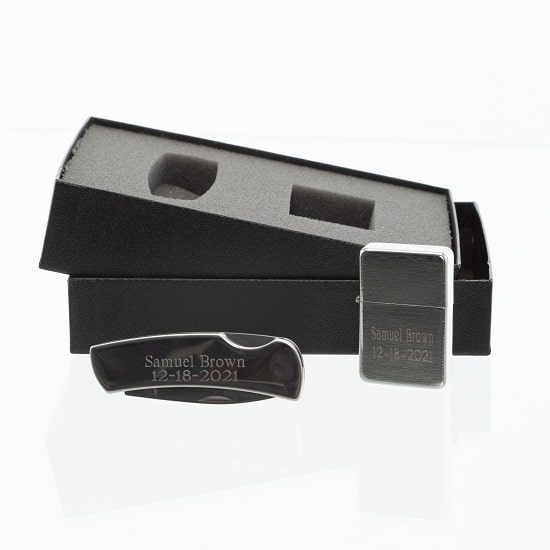 The groomsmen lighter and pocket knife set comes in a black gift box with custom foam cut-outs