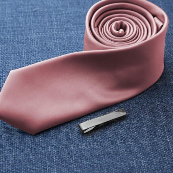 The black (gunmetal) tie clip will match any color and wedding style the groomsmen choose