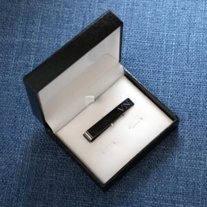 Each gunmetal tie clip arrives in a padded black gift box