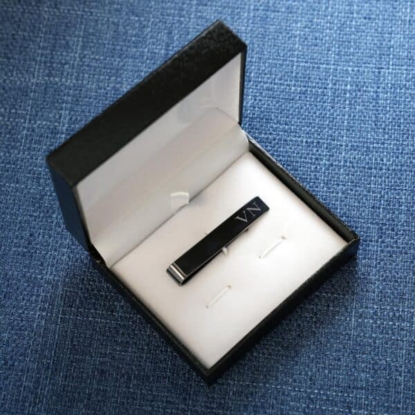 Each gunmetal tie clip arrives in a padded black gift box