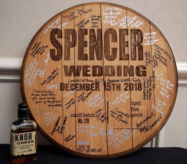 An authentic whiskey barrel heard that your wedding guests will sign as your guest book.