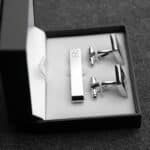 Each cuff link and tie tack set comes in a padded black gift box