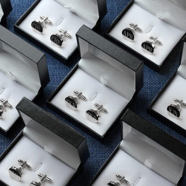 Matching silver round cufflink sets for groomsmen