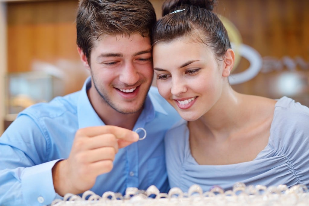 young couple ring shopping