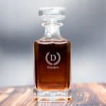 Laurel wreath design laser engraved on square decanter