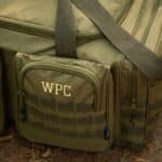 The front of the XL Tactical Duffle Bag custom embroidered with initials in yellow thread