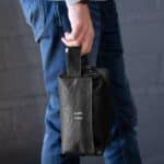 Black vegan leather dopp kit with carrying handle