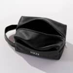 Interior of personalized black vegan leather toiletry bag