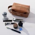 Fill our brown vegan leather dopp kit with all the toiletries you'll need for the next trip.