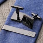 Custom engraving shown on gunmetal square cuff links and tie bar set