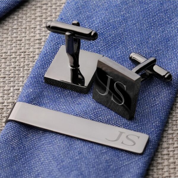 Custom engraving shown on gunmetal square cuff links and tie bar set