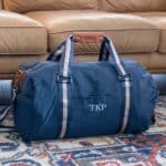 Close-up of personalized nylon duffle bag in navy blue