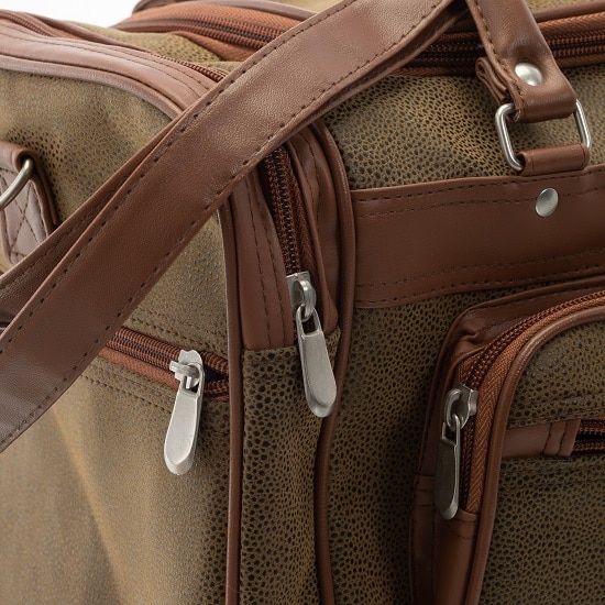 Handsome vegan leather accents are abound in the One Nigher Duffle Bag